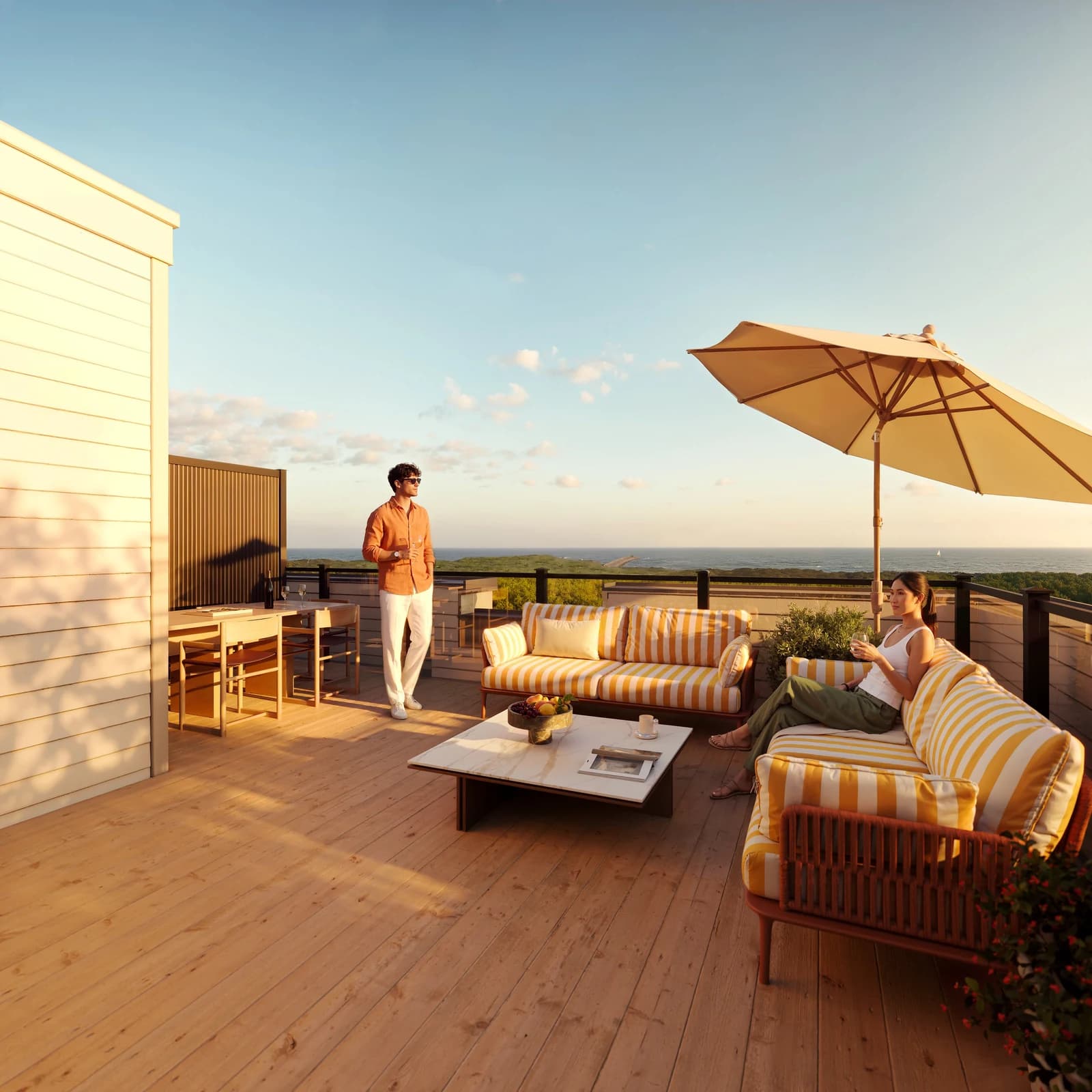 A spacious rooftop terrace with outdoor dining and lounge seating